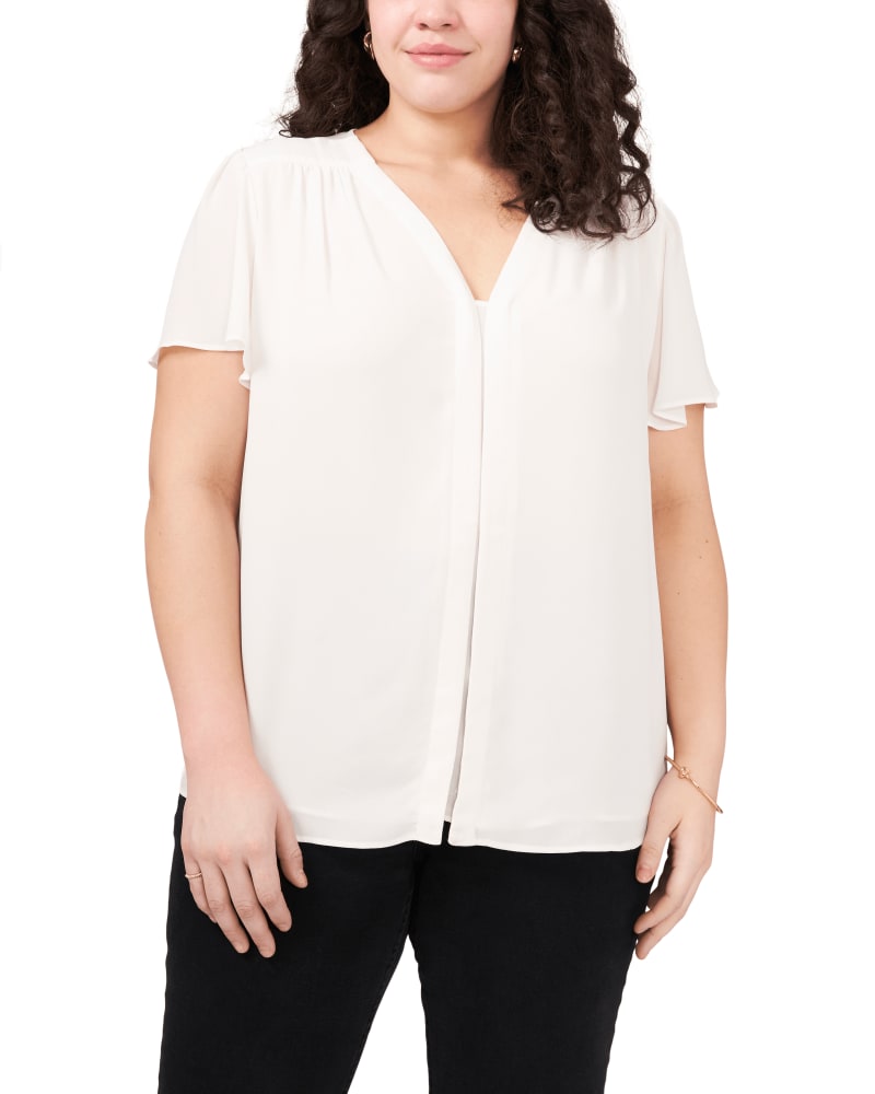 Front of a model wearing a size 1X Violet Flutter Sleeve Blouse in NEW IVORY by Vince Camuto. | dia_product_style_image_id:261419